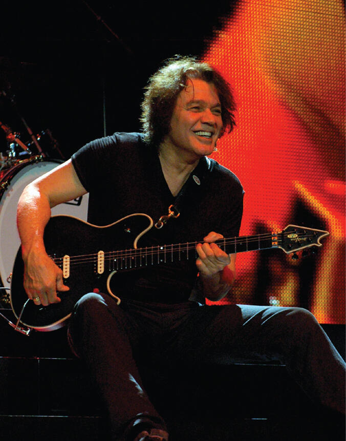 Edward Van Halen playing guitar using Furman P-3600 AR G